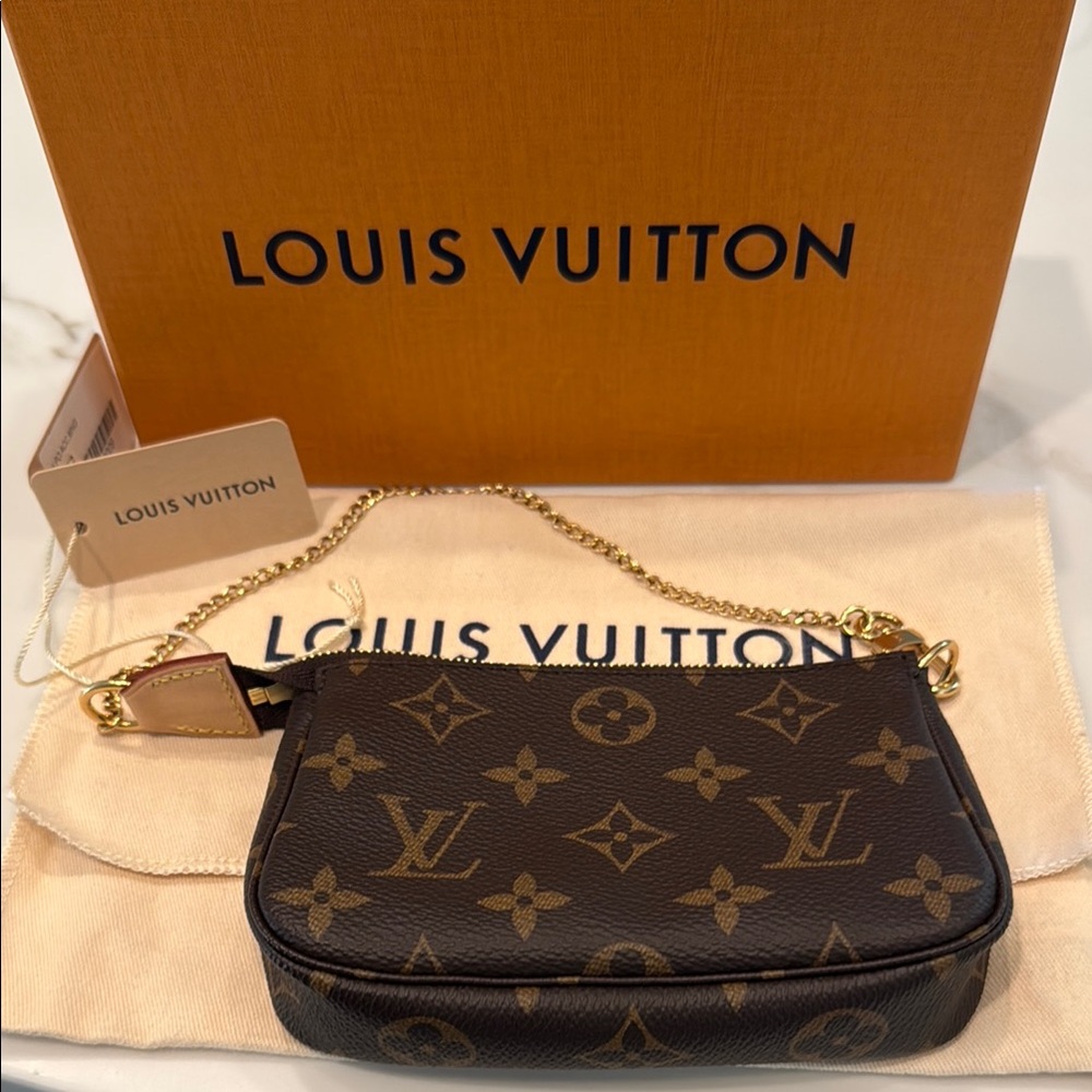 Louis Vuitton Black and Gold Monogram Clutch